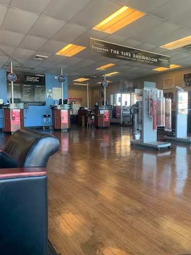 Dog walker Firestone Complete Auto Care Indio